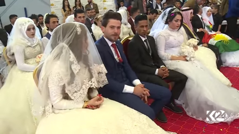 بالصور.. اربيل تحتضن عرسا جماعيا لـ 214 شابا وشابة